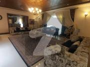 1000 Yards Bungalow Fully Furnished With Pool Basement...