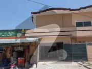 10 Marla Corner House With 4 Shops Available For Sale In...