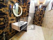 10 Marla Stylish Brand New House for Sale in Tariq...