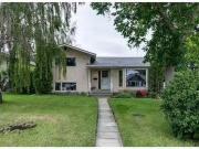 136 Holmwood Avenue Nw, Calgary, AB, T2K 2G8 house for sale.