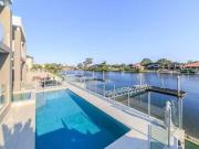 139 Sir Bruce Small Boulevard, Benowa QLD 4217 House For...