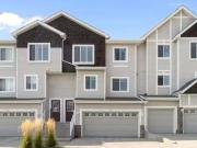 144 Hidden Creek Gardens Nw, Calgary, AB, T3A 6J5 townhouse.