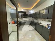 16 marla brand new corner triple store basement house...