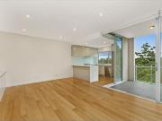 Convenient Top Floor Apartment with Lush Green Outlook