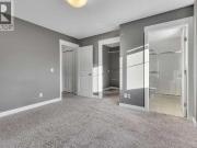 19 West Coach Manor SW, Calgary, AB T3H1R7 Townhouse For...