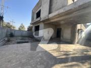 1.5 Kanal Residential Grey Structure Farm House For Sale