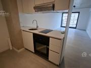 1 Amb. a Estrenar con Balcón en Piso Alto con Cochera,...