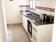 1 Dormitorio A con patio Edificio Miraggio