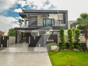 1 kanal brand new full furnished & full basement house...