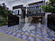 1 kanal brand new modern and facing park decent house...
