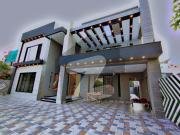 1 kanal brand new modern and facing park decent house...