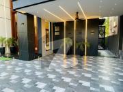 1 kanal designer house for sale in overseas a block...