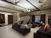 1 kanal full furnished modern bungalow with 10 kv solar...