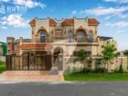 1 kanal house plus 1 kanal lawn lavish and ornate...
