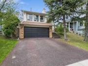 212 Woodbine Boulevard Sw, Calgary, AB, T2W 4K5 house...