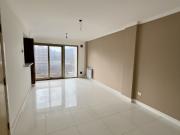 2 Ambientes con cochera descubierta