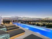 2 bed 2 bath + 1 car park, NE sea breezes, roof top pool...