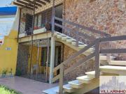 2 Casas sobrepostas + pavilhão