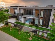 2 kanal furnished designer pool house for sale near park...