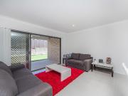 2 LIVING ZONES + AIR CONDITIONING + ALARM SYSTEM!