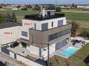2 Premium Villen direkt nebeneinander mit grünem...