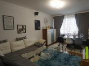 2 Wohnungen, Geschäftsfläche, 4 Dachbodenräume und 2 Garagen