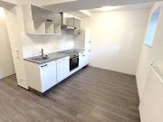 2 Zimmer Souterrain Wohnung mit Gemeinschaftsterrasse