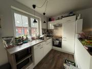 2 Zimmer Wohnung mit EBK, Terrasse & Grundstück