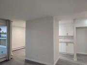 2BR townhome style condo across street from Market mall