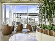 32 amenity spaces, including two rooftop swimming pools,...