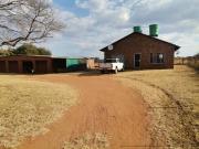 3 bedroom house with 2 flats on a pl.