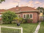 3 Bedroom Stand Alone Home on a Quiet Tree Lined Street