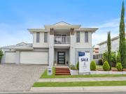 3 Master Rooms w/ Ensuites and 3 Car Garage Simply Unique!