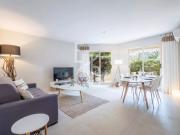 3 pièces en rez de jardin avec piscine et garage à 5...