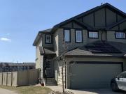 4 bedroom 3.5 bathroom Duplex with Solar panels
