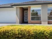 4 Bedroom Home Close to Shopping and Schools