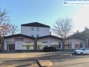 4 Familienhaus und Bankgebäude, aufgeteilt nach WEG,...