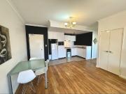 Partly Furnished Top Floor Apartment