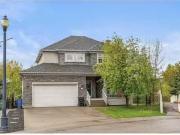 57 Strathlea Court Sw, Calgary, AB, T3H 4T4 house for sale.