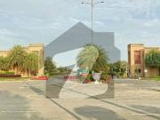 5 marla plot on carpeted road with all dues paid...