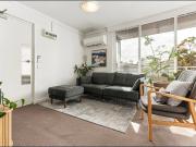 Stylish Lakeside Apartment with Inner City Convenience