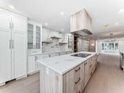 64 Woodstock Road SW Calgary, AB T2W 5W2