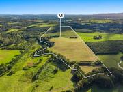 73 acres of pristine vacant hinterland, walking distance...