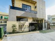 7 marla double heighted + rooftop sitting designer brand...