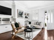 Exquisitely Renovated Dual Level Period Home