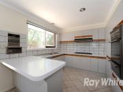 A 4 bedroom, 2 bathroom home close to Rowville Lakes shops