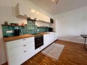 A beautiful apartment with a parking spot in...