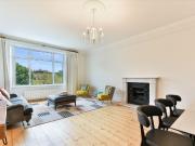 A bright and spacious second floor apartment with high...