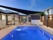 A Coastal Luxe Sanctuary of Elevated Family Living in...