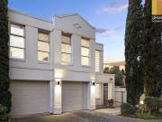 A Contemporary Home Showcasing Light, Luxury & Location!